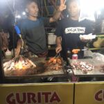 Suasana pasar malam dengan jajanan kuliner khas
